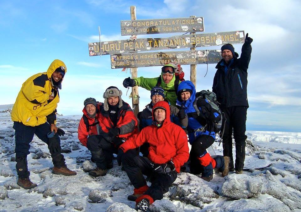 How do I choose the best time for climbing Kilimanjaro?