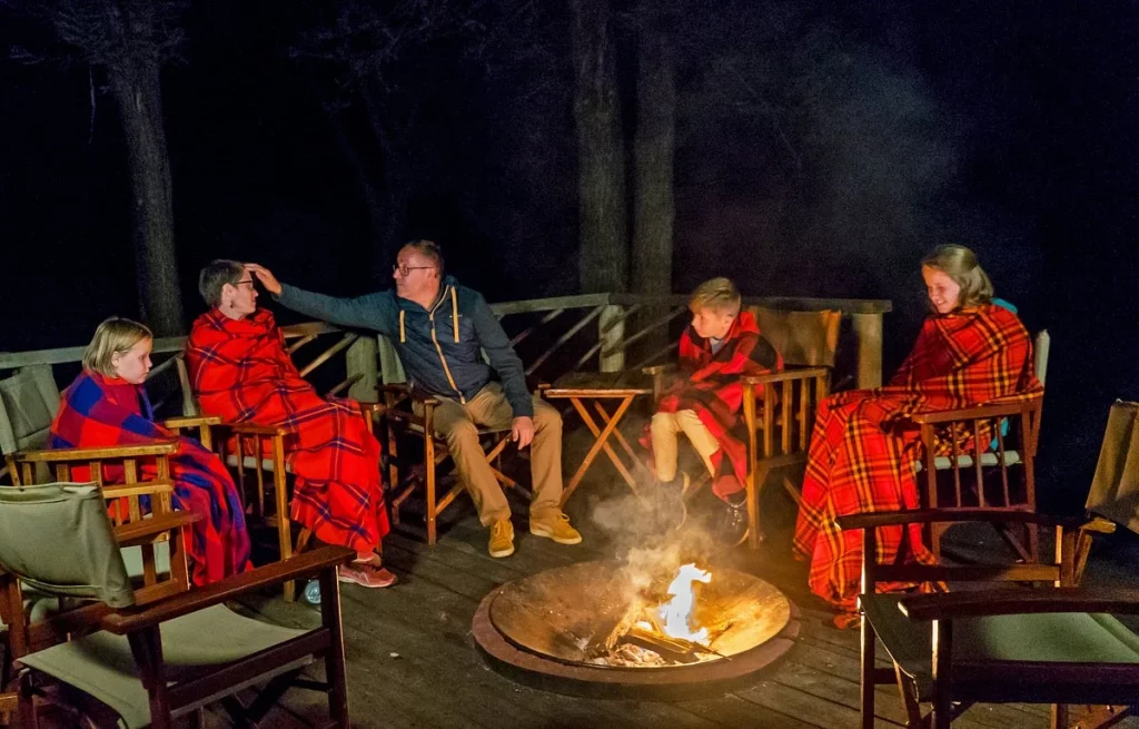 Maasai Mara lodges with evening bonfire